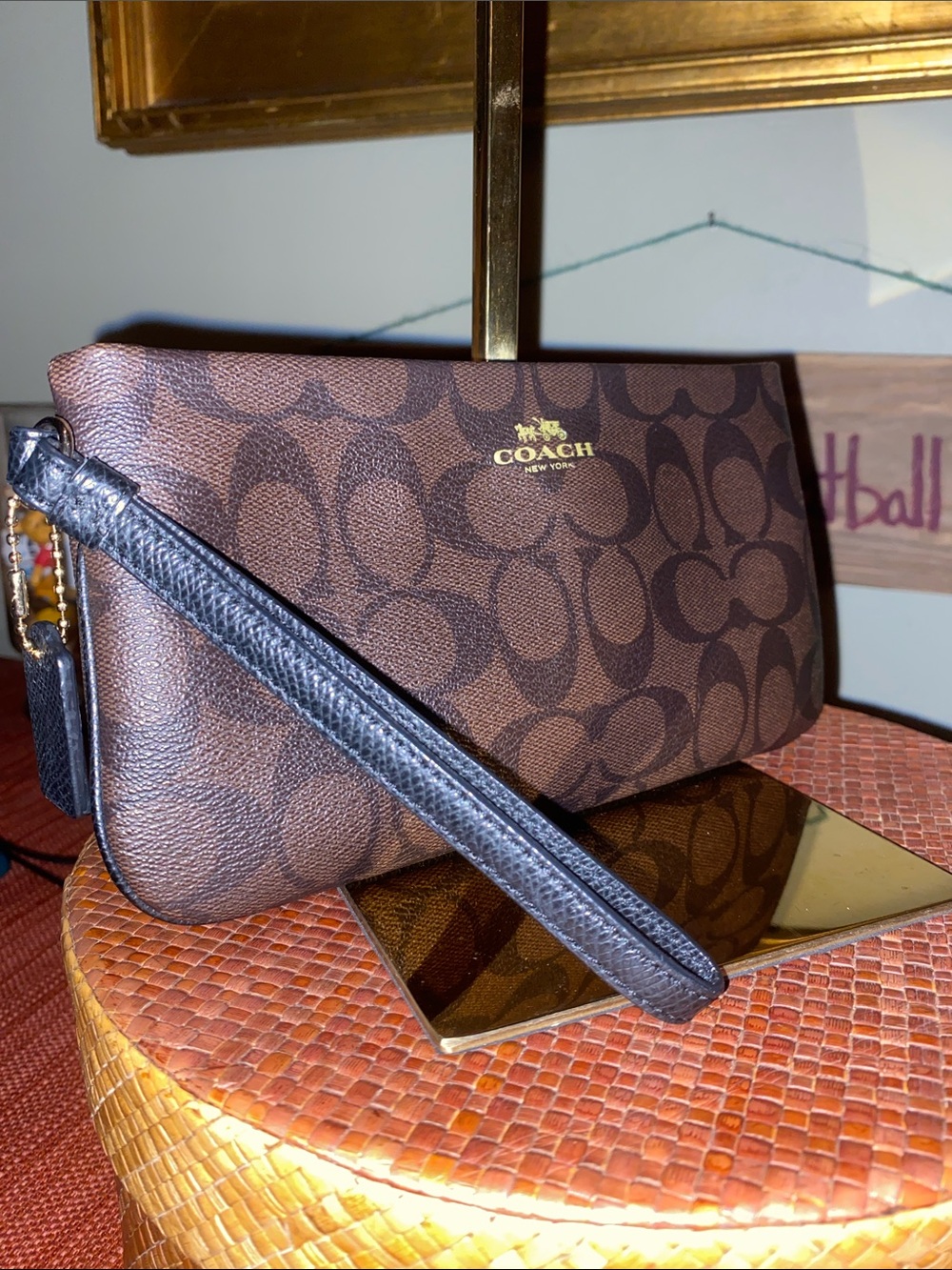Coach Large Corner Zip Wristlet with signature brown canvas monogram